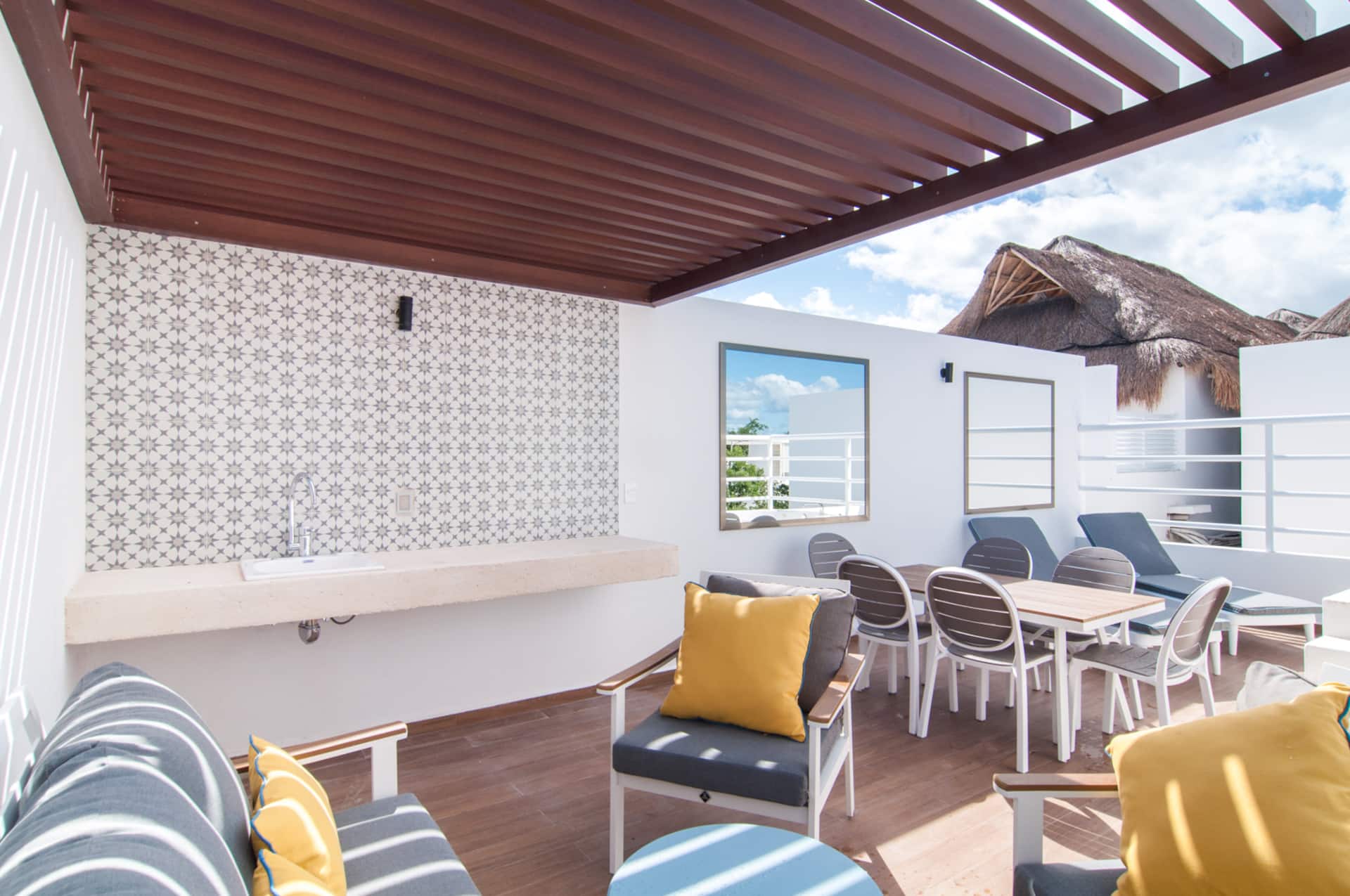 TAO Tulum PH310 rooftop terrace with lounge seating and outdoor dining